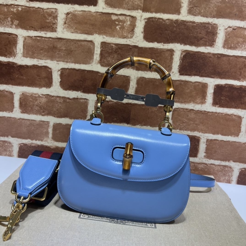 G*u*i top handle bags